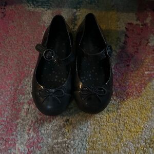 Black mini Melissa flat